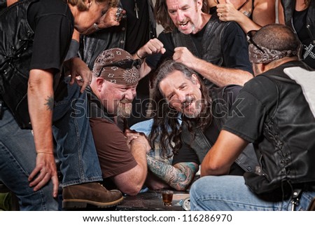 Man loses an arm wrestling match with tough gang member