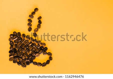 Built coffee cup shape from coffee beans