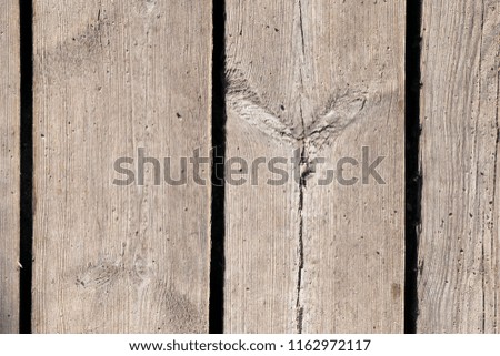 closeup photo of an old wooden surface of a constructed structure