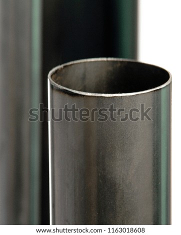 industrial metal isolated steel tube closeup shine texture ppe construction material white background and bokeh tube pipe quality fabric steel production stock 