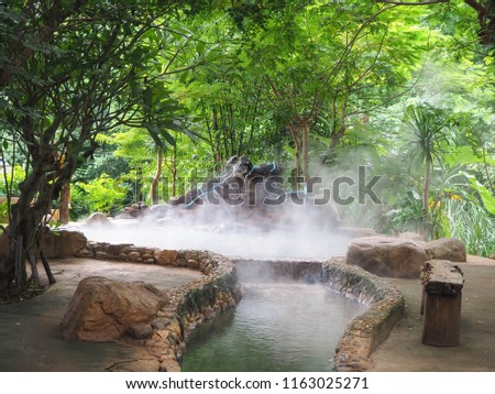 Beautiful and Shady  foot soak onsen, at Mae Khachan Hot Spring in Mae Khachan district, Chiang Rai, Thailand Royalty-Free Stock Photo #1163025271