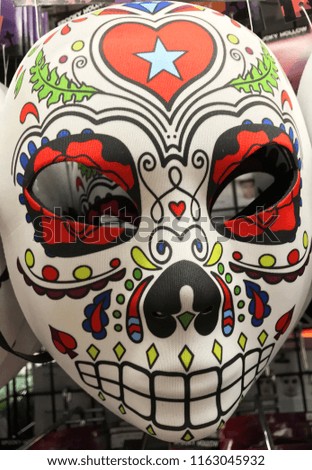 Closeup of scary mexican halloween mask with bright colours