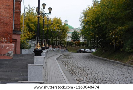 
The bridge leads to the historic center of Tomsk, to the park "Beginning". Tomsk, Siberia, the picture is made on an autumn sunny day.
