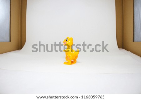 Dinosaur, Plastic Toy Animal isolated on white background in the light box.