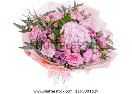 Bright composition from fresh flowers, the white background