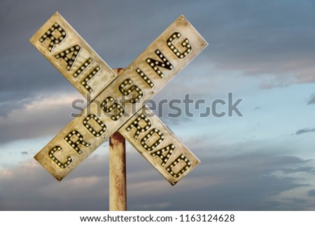 Railroad Traffic Sign - Road sign of train crossing road on sky background