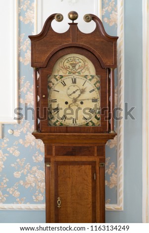 big wooden old-fashioned floor clock
