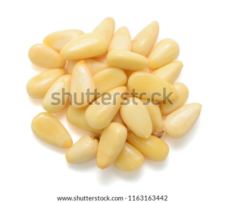 pine nuts isolated on white background Royalty-Free Stock Photo #1163163442