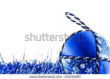 Italy. Traditional handmade Christmas ball made of white and blue fabric
