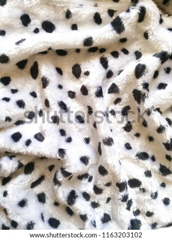 fur artificial fur black-and-white color as the skin of a dog parodies Dalmatian background design

