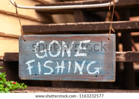 Sign saying Gone Fishing