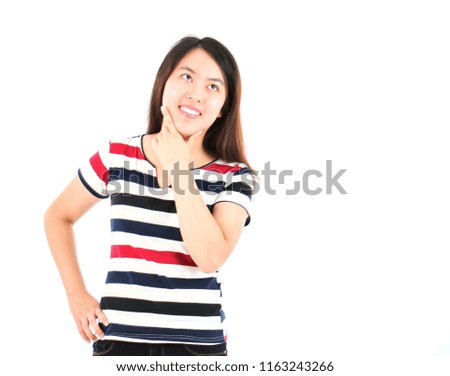 Happy asian woman thinking against a white background