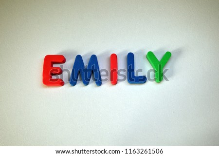 Emily - popular girls name from colorful letters on white background. Emily common female name.