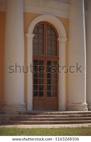 Arched wooden door