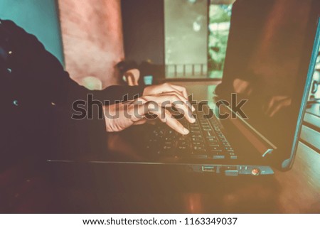Woman hand using laptop and smartphone to work study on bed in room with nature beautiful background. Business, financial, trade stock maket and social network freedom life concept.