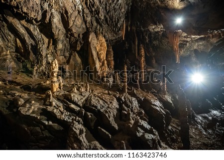 Stalactites and stalagmites in a cave,at national park of Aggtelek, hungary