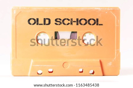 A vintage cassette tape from the 1980s era (obsolete music technology) labeled Old School (my addition, not in the original image). Color: cream, sand. White background.
