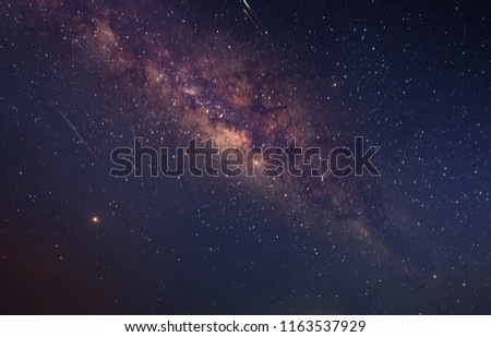 Milky way galaxy with starry night sky at Tip Of Borneo, Malaysia. soft focus and noise due to long expose and high ISO.