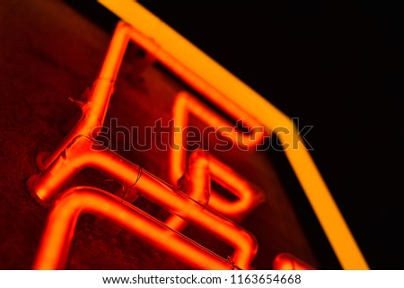 Complex red and yellow neon sign