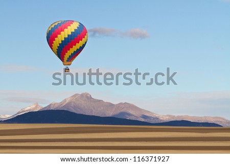 Picture of a Hot Air Balloon over the Colorado Rocky Mountains Twin Peaks, Mt Meeker and Longs Peak, Boulder County.