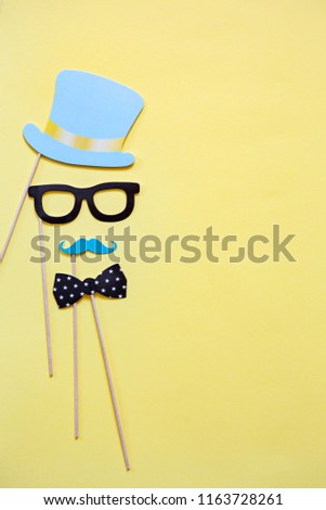accessories made of paper, hats, glasses, masks, crowns, lips and mustaches
