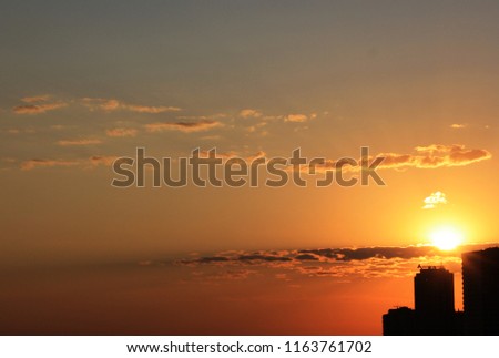 sunset over buildings

