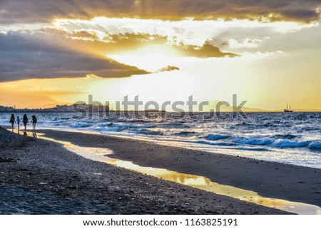 Sunset at the beach of the city of Rethymnon