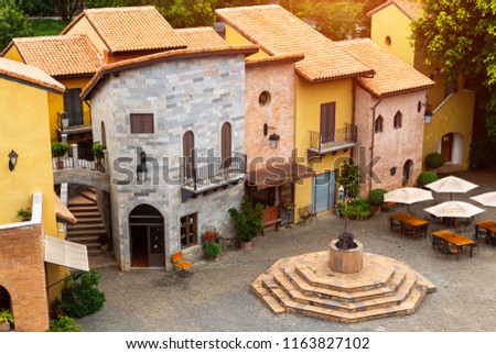 Old Italian village style building in morning sun lighting.
