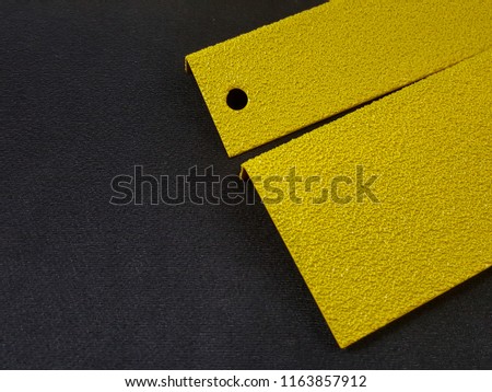 Anti-slip yellow on black background