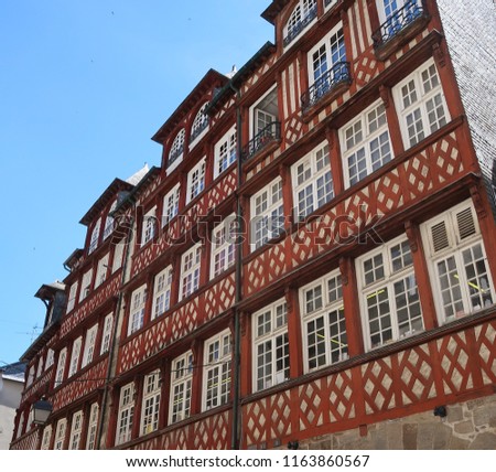 Photography that is showing some half-timbered buildings