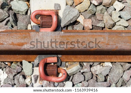 Construction of a new railway line.pile of new rusty rails