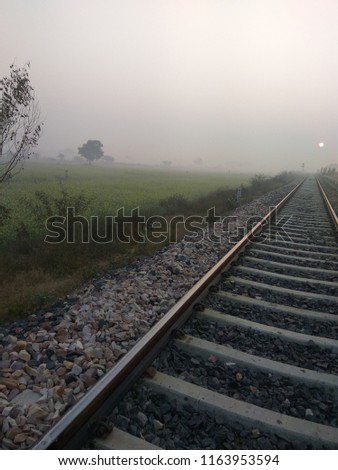 Morning picture of railway track at the time of rising sun.