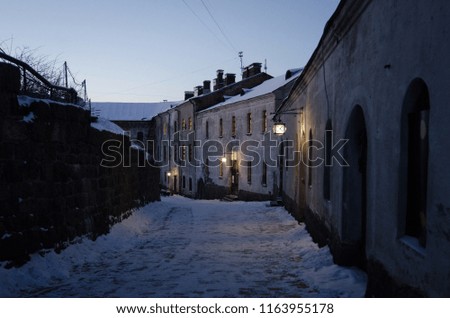 The Vyborg Castle at dusk in the Winter