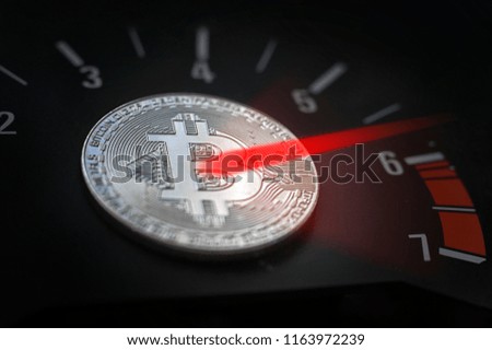 crypto currency bitcoin silver representation on speedometer