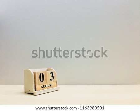 August 3rd,Image of number 3 wooden on grey and light brown color background with space for your text and design.Concept be used for birthday, appointment and deadline.Blur picture and vintage style.