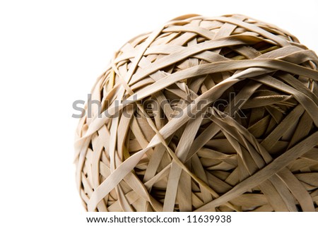 Ball made of rubber bands on white
