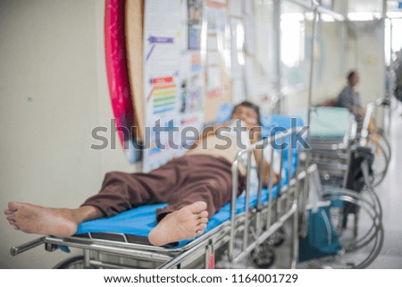 Blur image of patients in the hospital waiting to see doctor and treatment.