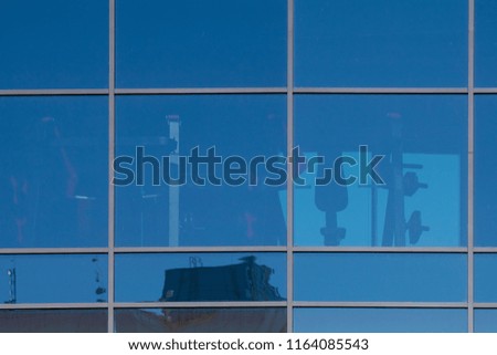 Background for design of a window texture on a wall of modern buildings business centers
