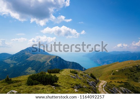Monte Baldo mountain and Lake Garda in Malcesine. Province of Verona in the Italian region Veneto, Royalty-Free Stock Photo #1164092257