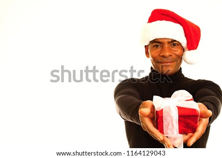 man with Christmas presents on white background stock photo