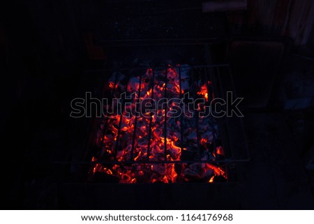 Hot coals for shish kebab in the grill