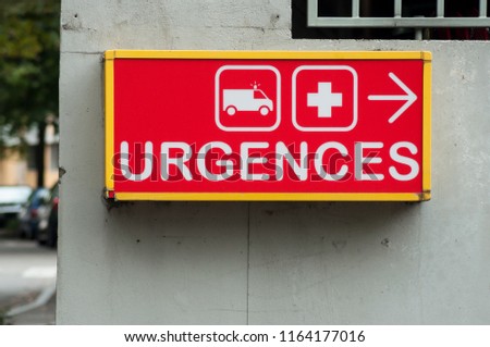 closeup of french hospital emergency entry sign with text in french ( urgences)
