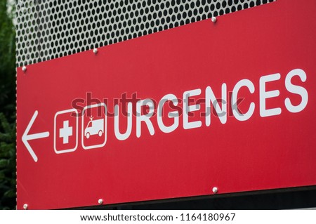 closeup of french hospital emergency entry sign with text in french ( urgences)