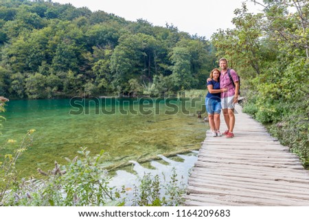Tourists in Plitvice lakes in Croatia