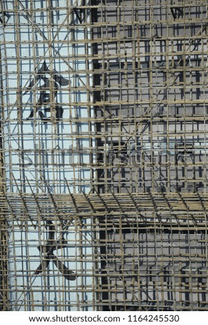 bamboos scaffolding with the chinese word "warehouse"
