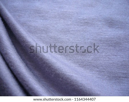 Texture of fabric. Gray viscose cloth. Gray jersey.