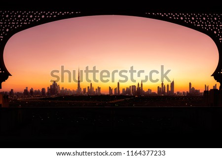 Beautiful Arabic frame showing the skyline of Dubai. Magical travel inspiration.