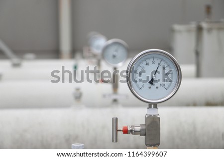 measuring the pressure on the manometer or pressure gauge industrial Royalty-Free Stock Photo #1164399607