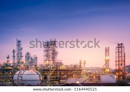 Oil and gas refinery plant or petrochemical industry on sky sunset background, Factory with evening, Gas storage sphere tank in petrochemical industrial Royalty-Free Stock Photo #1164440521