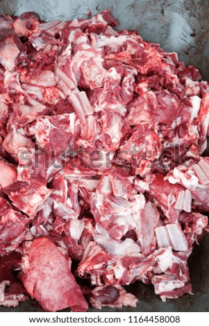 A picture of fresh meat in pile mix with internal organ and ribs in Port Klang.